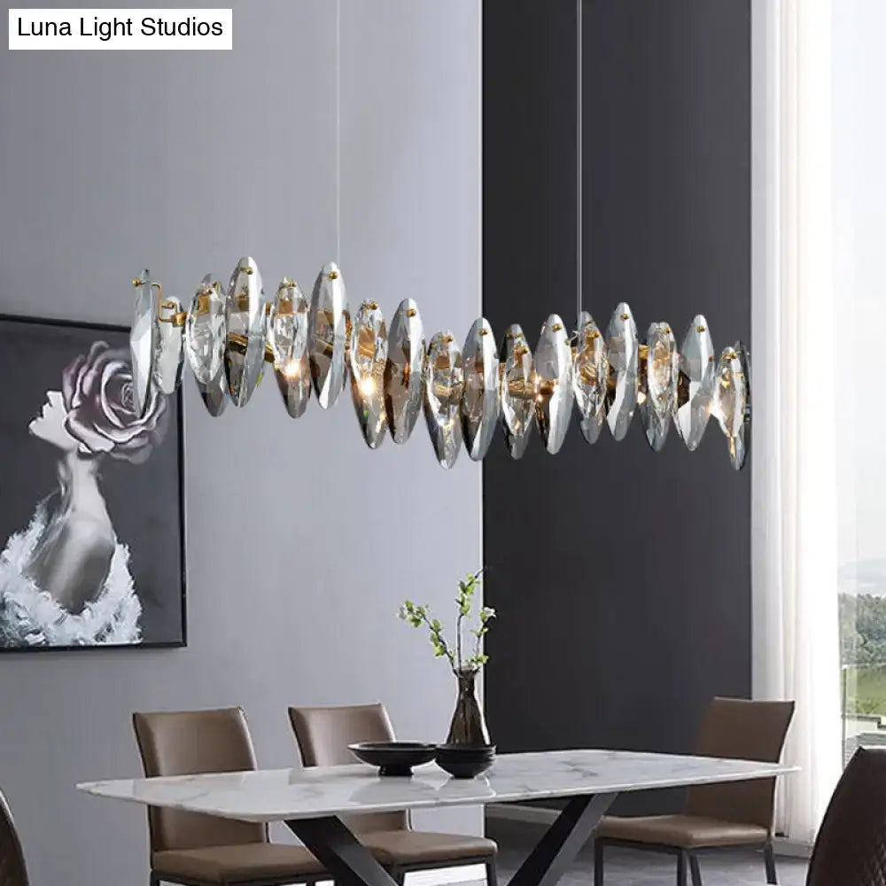 A decorbites™ postmodern smoke grey glass leaf suspension lamp with clear crystal discs and gold rods for restaurant use