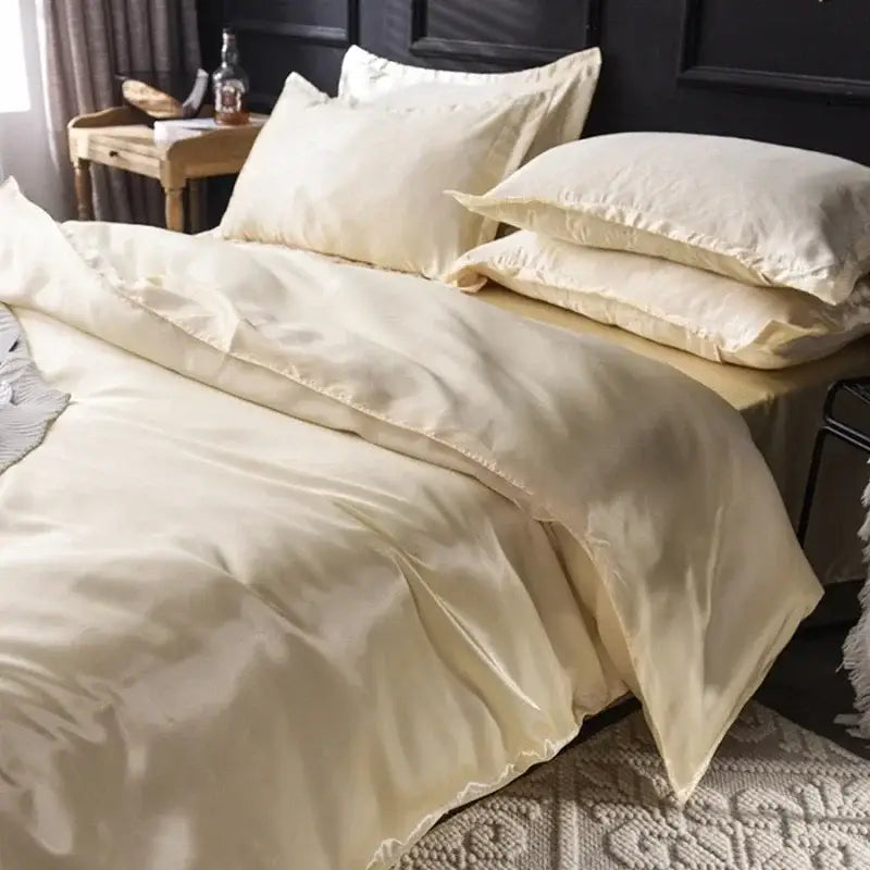Cream-colored satin duvet cover set with matching pillows from decorbites premium bedding collection suitable pcs bed sheet