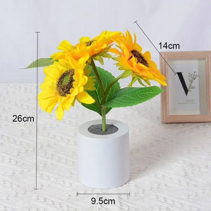 Decorbites™ rechargeable led night light featuring bright yellow artificial sunflowers in a white cylindrical pot