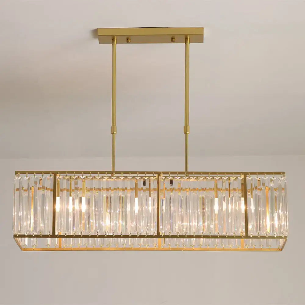 Gold-finished DecorBites rectangular clear crystal island pendant light with vertical rods for dining room suspension lighting