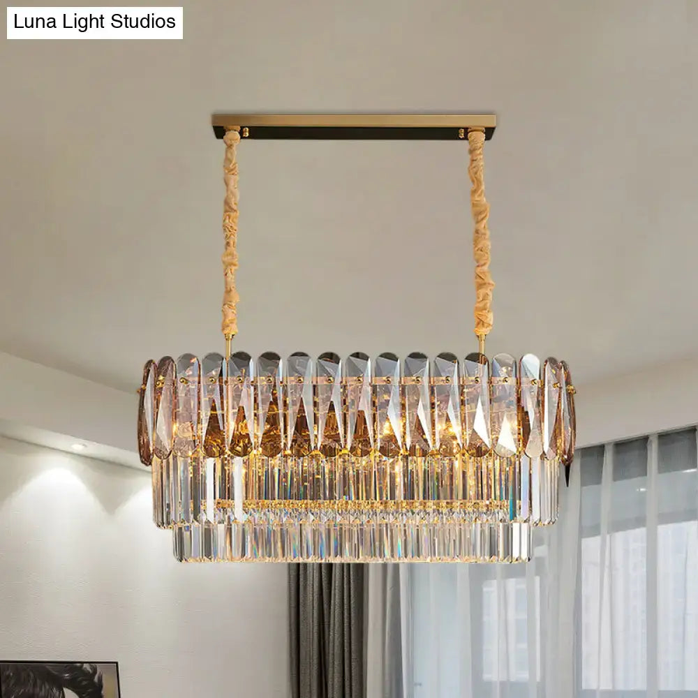 Decorbites rectangular dining room pendant with 3-tier amber and smoke gray crystal prisms on twisted gold cords