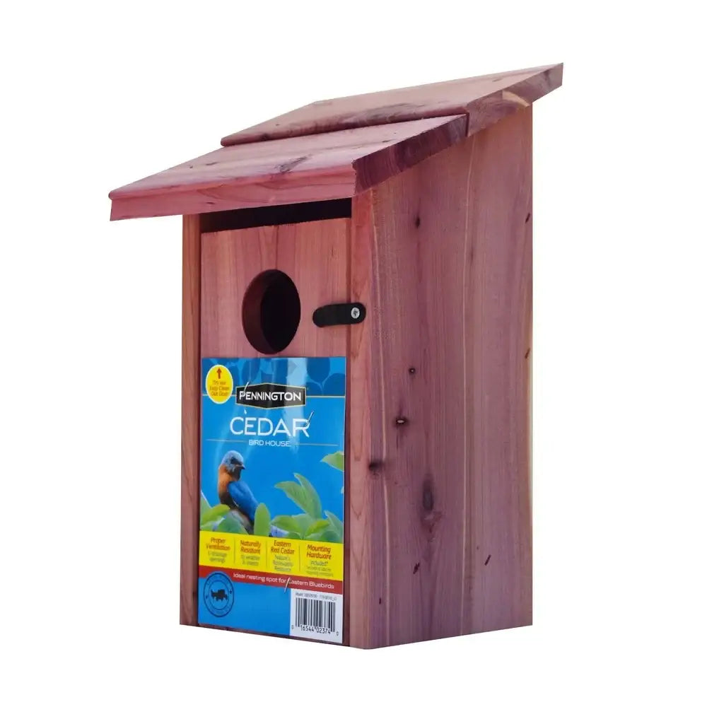 Pennington cedar birdhouse with reddish-brown exterior, slanted roof, and circular hole in red cedar bluebird house design