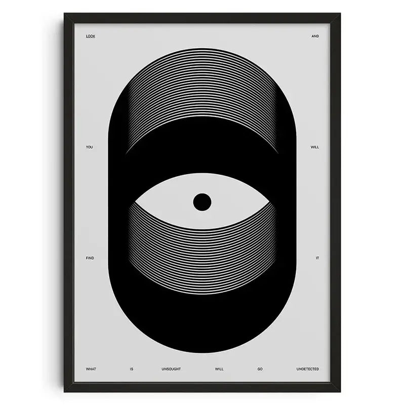 Black-framed DecorBites™ retro abstract canvas print featuring a stylized white concentric eye on light gray background