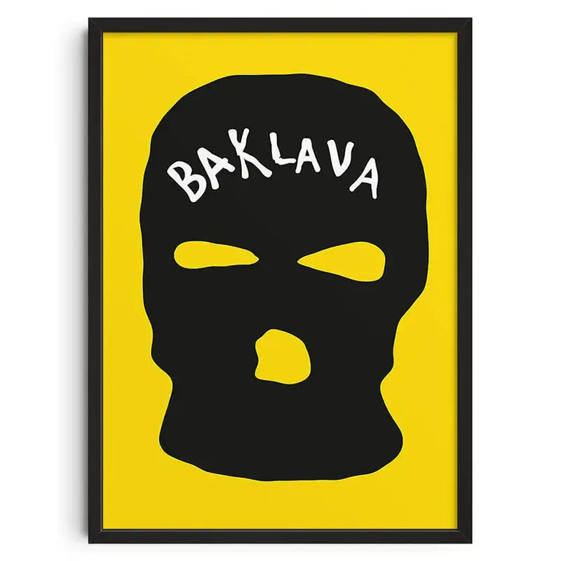 Decorbites™ retro abstract canvas print featuring a black ski mask with bold yellow cutouts in a black frame on yellow background