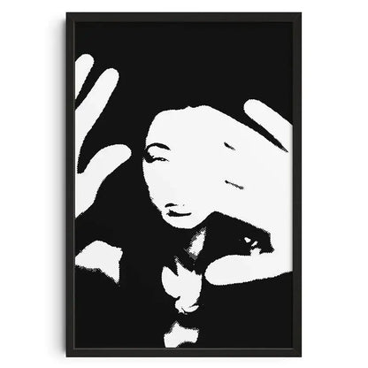 Black-framed canvas print wall art featuring a retro abstract stylized portrait of a woman in white by DecorBites™