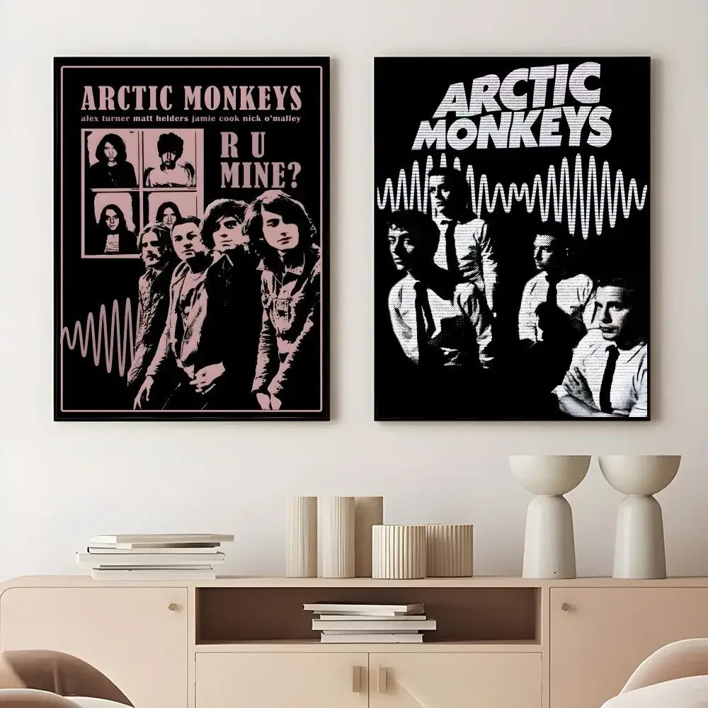 Two framed retro Arctic Monkeys wall art posters in pink and black wave design and black and white style