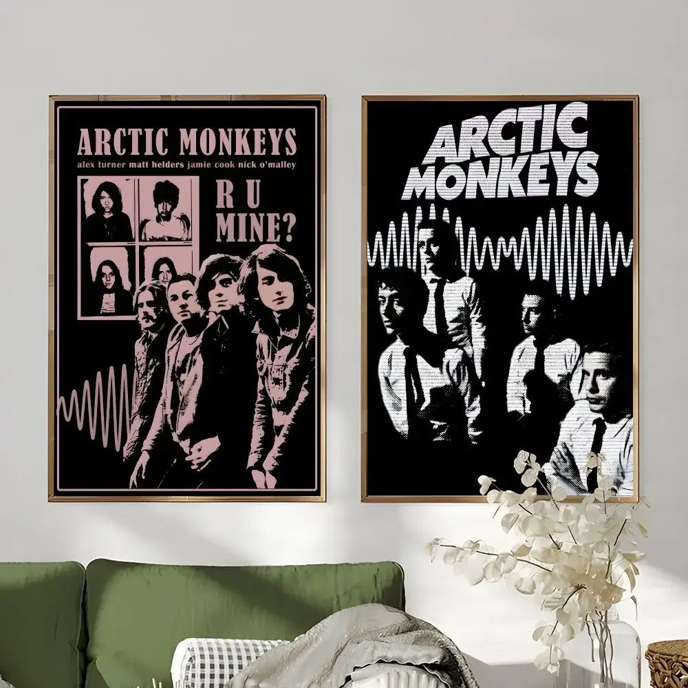 Two framed retro arctic monkeys wall art posters in pink black and black white featuring band members and wave patterns