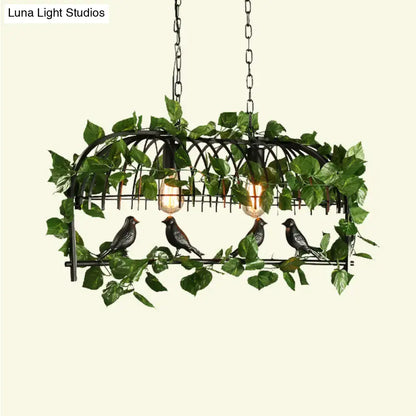 Black wrought iron retro birdcage island light fixture with artificial vines and four decorative birds for ceiling use