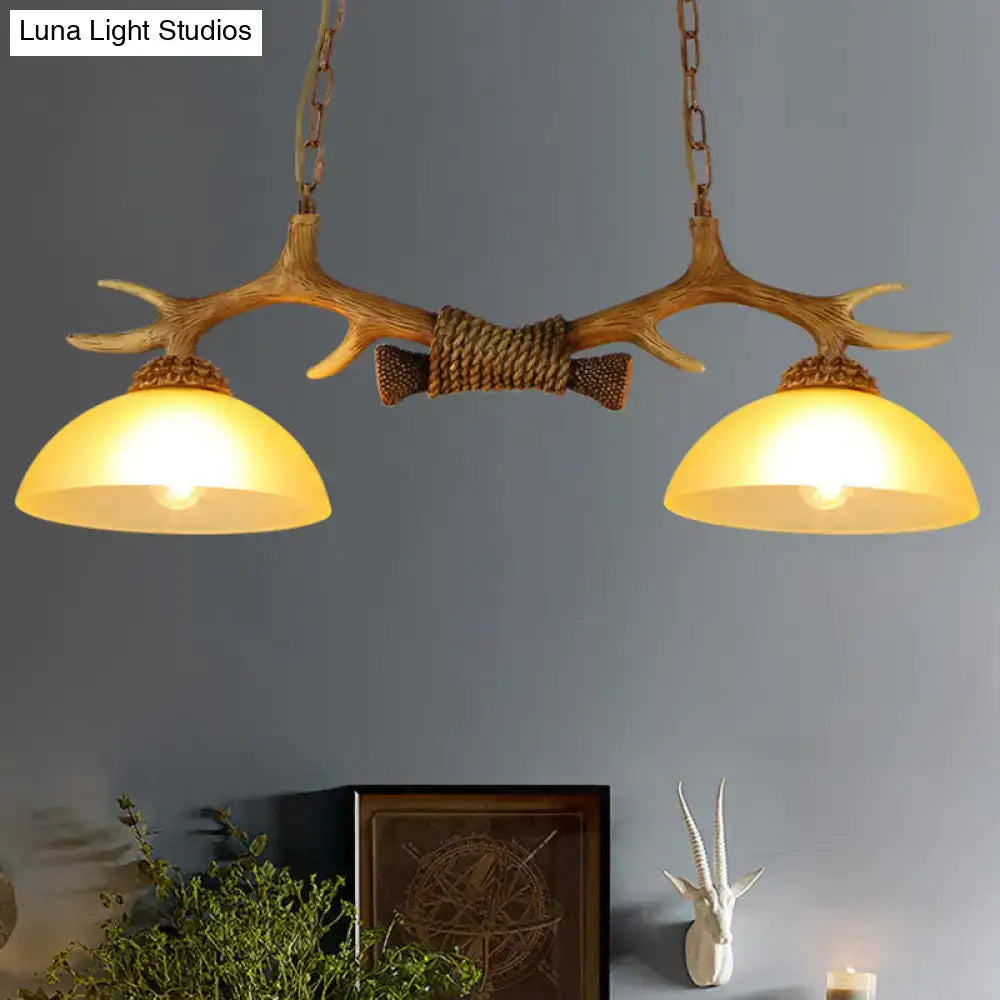 Decorbites retro dome pendant light set with beige glass shades and decorative deer horn center wrapped in rustic rope