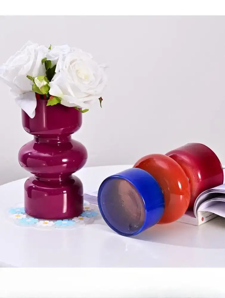 Vibrant fuchsia retro glass vase with stacked rounded segments and glossy finish for diy flower arrangements