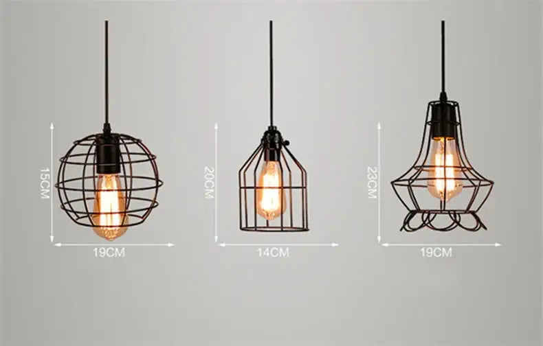 Three black wrought iron art pendant lights with vintage edison bulbs in retro iron art cage designs by decorbites