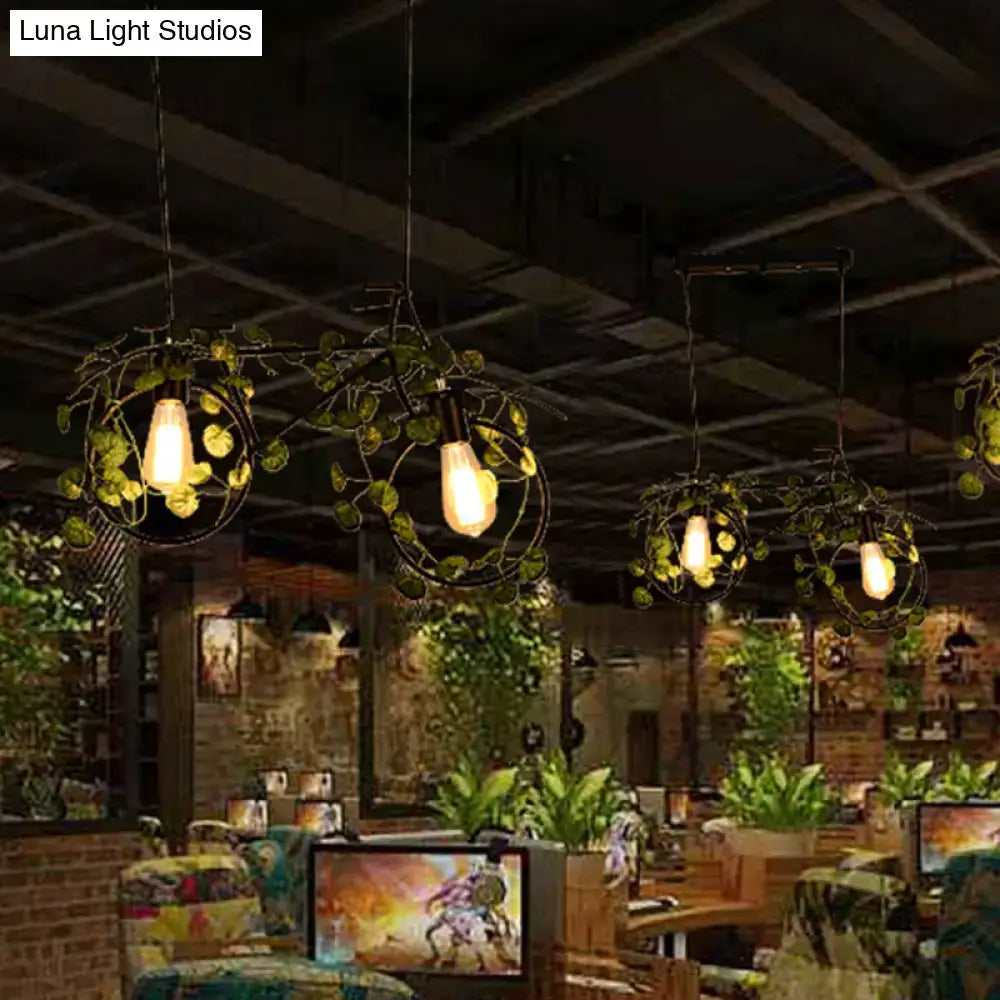 DecorBites™ retro metal bicycle restaurant ceiling light with black wrought iron pendant lamps and green plant decor
