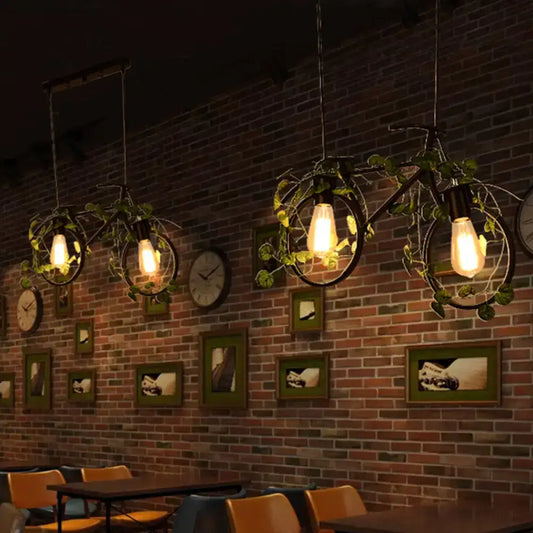 DecorBites™ retro metal bicycle restaurant ceiling light with black wrought iron frames, exposed bulbs, and plant decor
