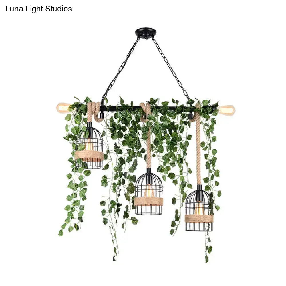 DecorBites™ retro black metal birdcage chandelier with hanging green ivy and rope accents for restaurant lighting