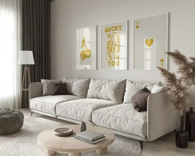 Beige upholstered sectional sofa with dark gray throw pillows complementing decorbites retro queen of hearts canvas art set hearts canvas art