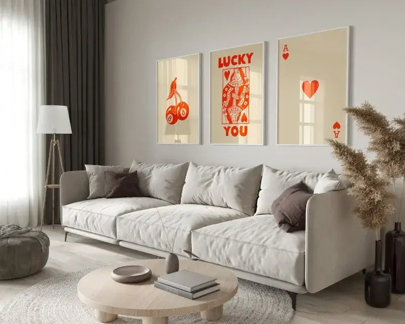 Beige sofa with gray and brown throw pillows in a room featuring decorbites™ retro queen of hearts hearts wall art posters