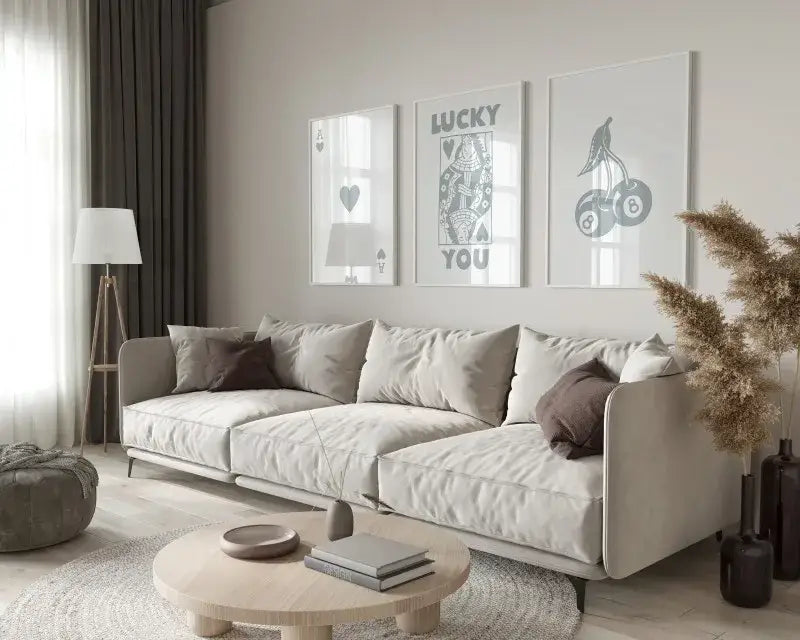 Beige upholstered sectional sofa with soft rounded armrests complements decorbites™ retro queen of hearts wall art posters