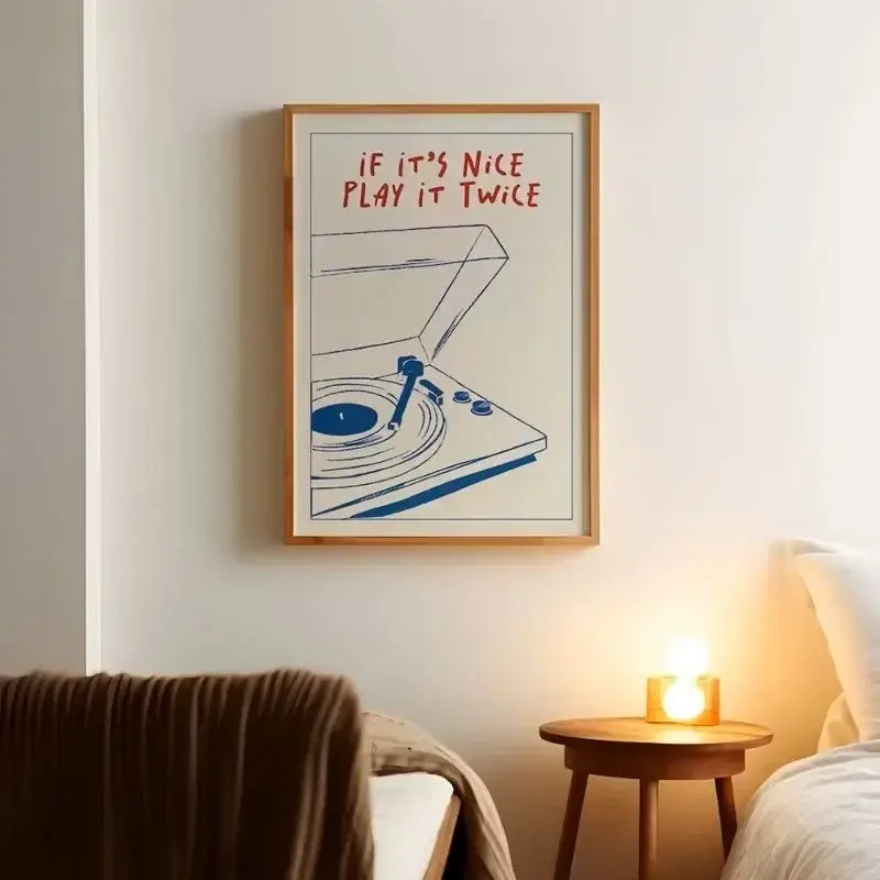 A DecorBites™ retro record player canvas wall art featuring a minimalist blue and red record player illustration