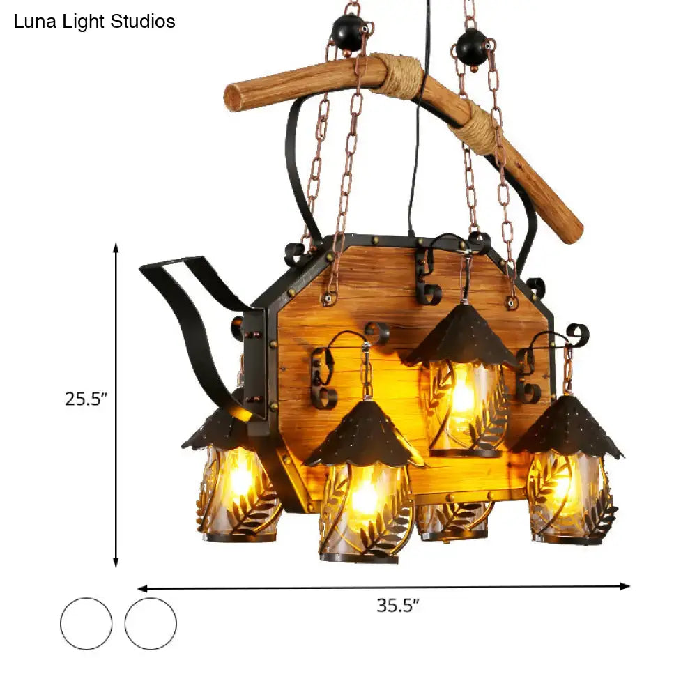 Rustic wooden teapot-shaped chandelier with black metal accents and white fabric clear glass shade for restaurants