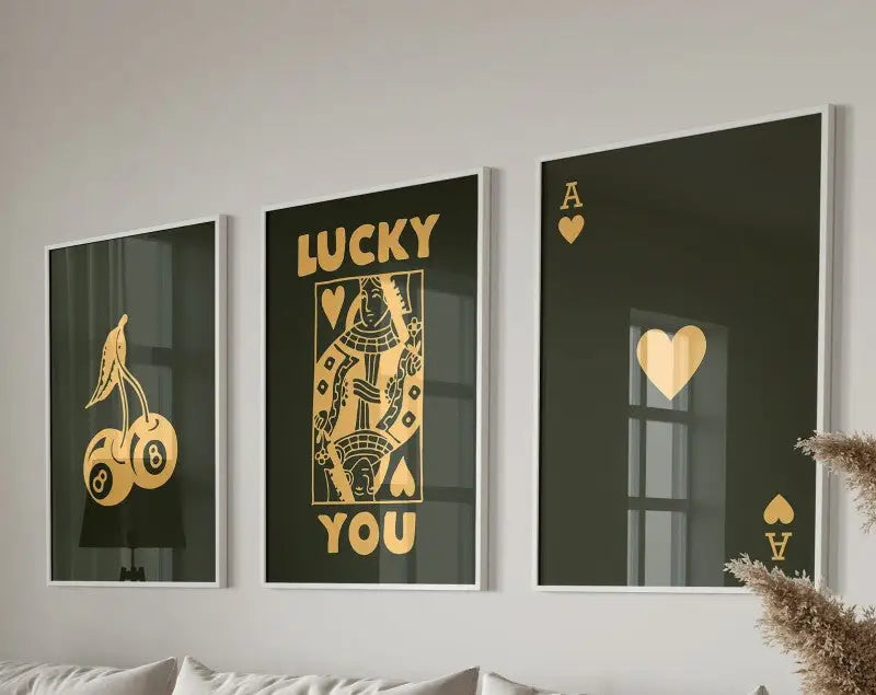 Set of three DecorBites retro wall art posters featuring black and gold foil playing card designs on dark backgrounds