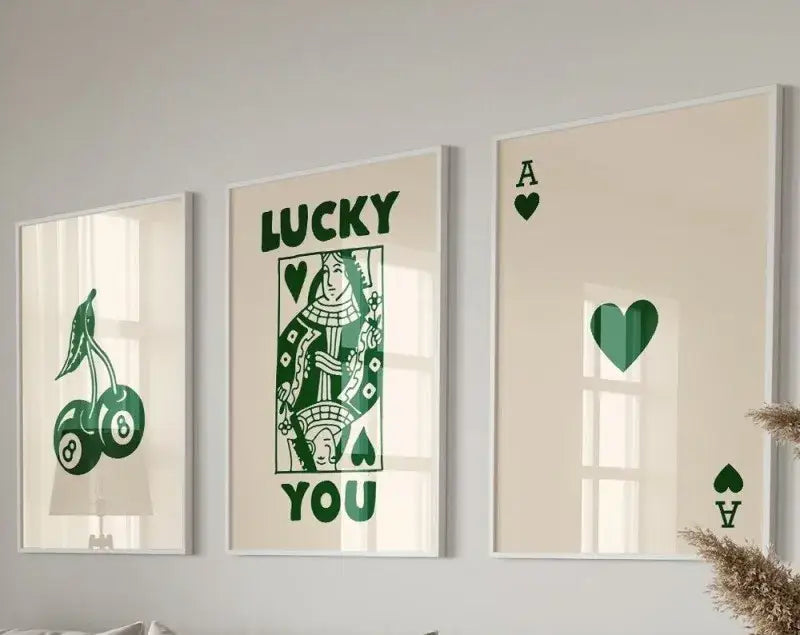 Set of three decorbites™ retro wall art posters featuring green playing card and lucky charm designs on cream background