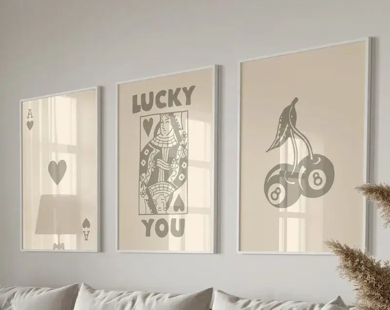 Three framed decorbites™ retro wall art posters set featuring queen of hearts playing card motifs on beige backgrounds
