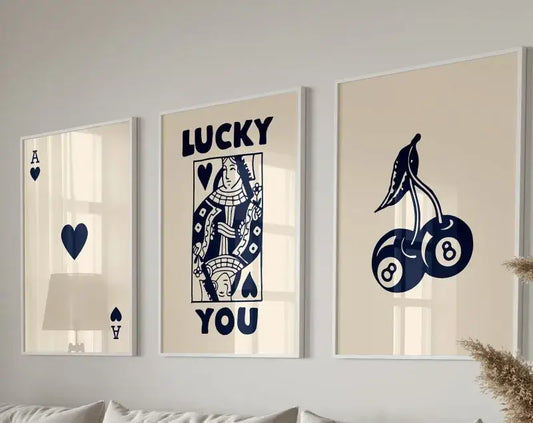 Three framed decorbites™ retro wall art posters set featuring navy blue queen of hearts casino designs on cream background