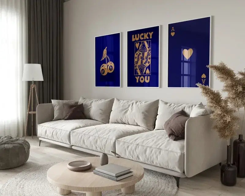White sectional sofa with beige and brown throw pillows alongside DecorBites™ retro wall art posters set queen of hearts