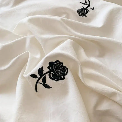 White fabric duvet cover set with black rose embroidered design from DecorBites™ princess style rose embroidered duvet