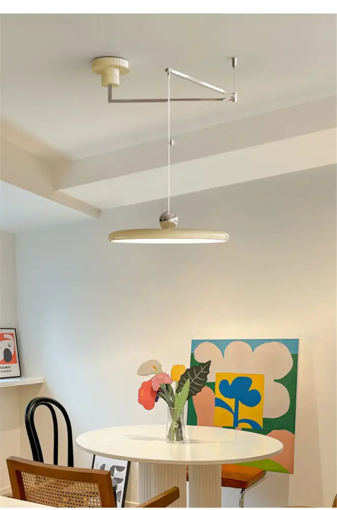 DecorBites™ rotatable nordic led pendant light with a sleek beige circular diffuser and polished chrome arm chandelier