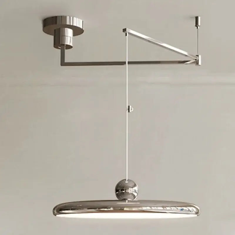 DecorBites™ rotatable Nordic led pendant light in cream iron with chrome finish and sleek oval shade with spherical accent