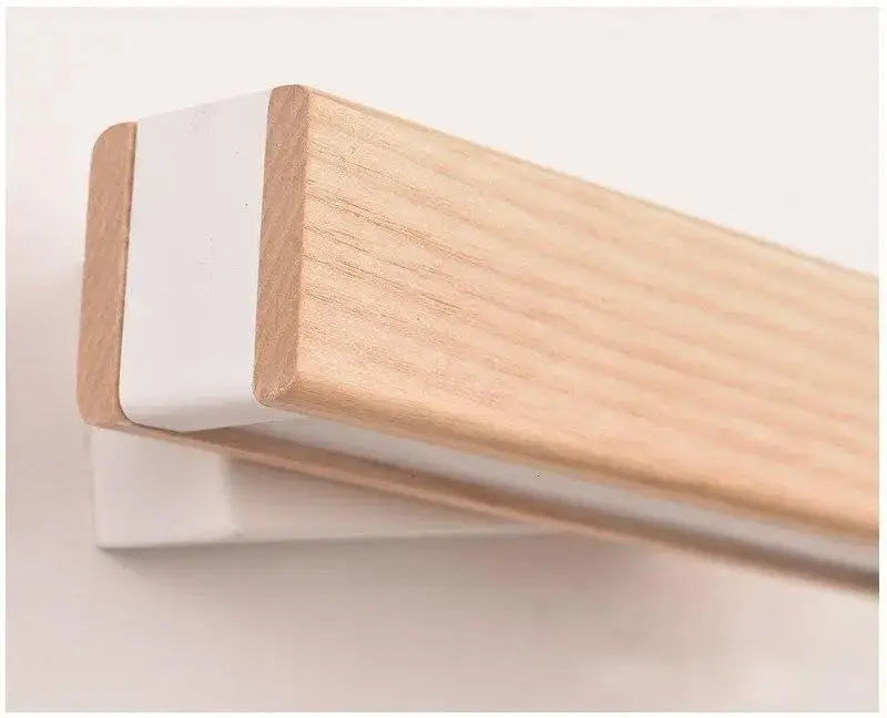 Decorbites™ rotated led modern wall sconces with light-colored wooden shelf and white plastic backing wall sconces