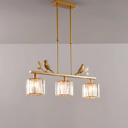 Gold-toned decorbites rustic 3-head cylindrical crystal island lighting with bird and leaf decor for dining room