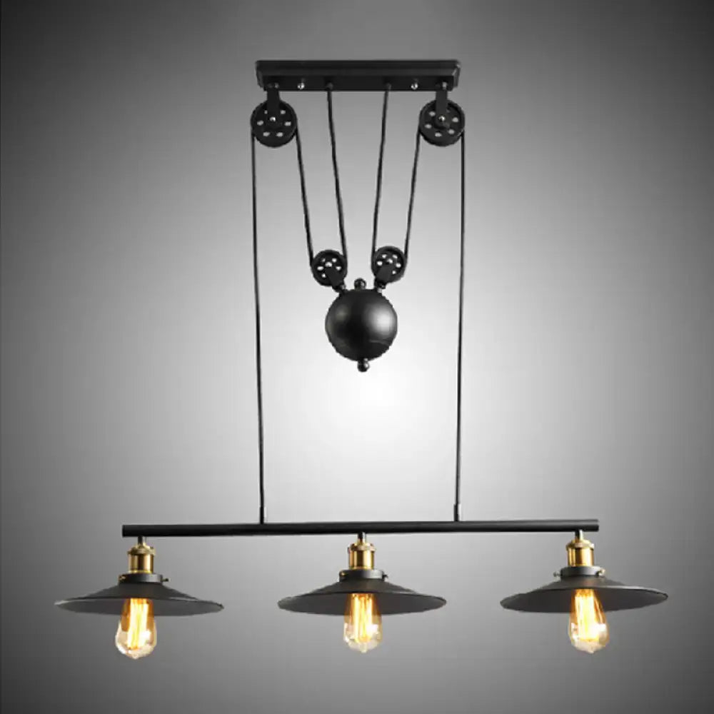 Industrial-style DecorBites™ rustic 3-head pendant light with black flared shade and pulley system for dining room island