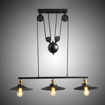 Industrial-style DecorBites™ rustic 3-head pendant light with black flared shade and pulley system for dining room island