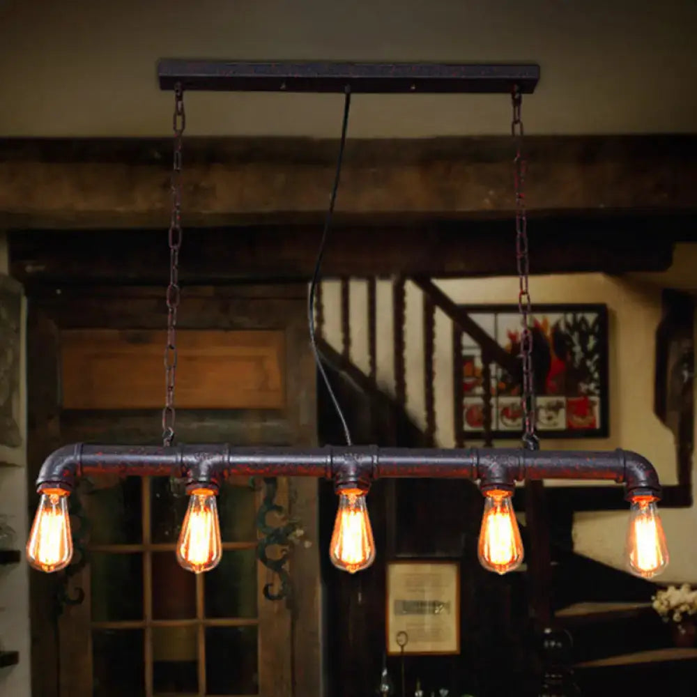Decorbites™ rustic black iron plumbing pipe pendant light with four glowing edison bulbs for table and island