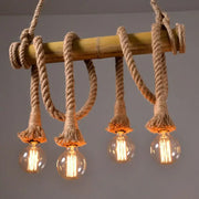 DecorBites™ rustic brown island pendant light with bamboo pole and beige rope suspending four edison bulbs