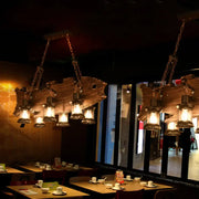 DecorBites rustic fish shaped wood hanging lamp with 6 glass lanterns in brown featuring e26 e27 bulbs