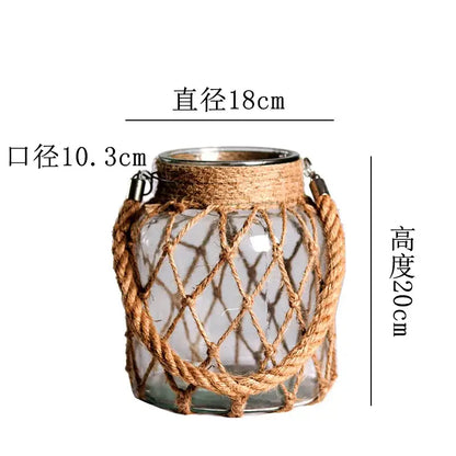 DecorBites rustic hanging glass vase with clear glass, woven hemp rope netting, and metal hardware accents