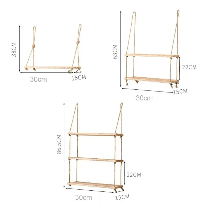 Light-colored rustic wood floating wall shelves by decorbites with natural rope suspension and small caster wheels set of 3