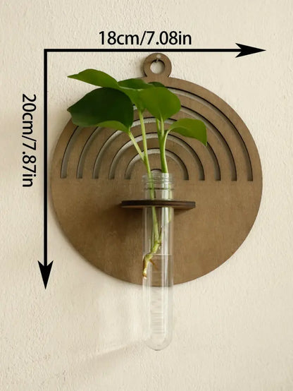 DecorBites™ rustic wood wall vase with a clear glass test tube and small green plant mounted on wood wall decor
