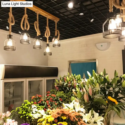 Rustic wooden linear island lamp with natural rope suspension pendant light and mesh cage for restaurant use