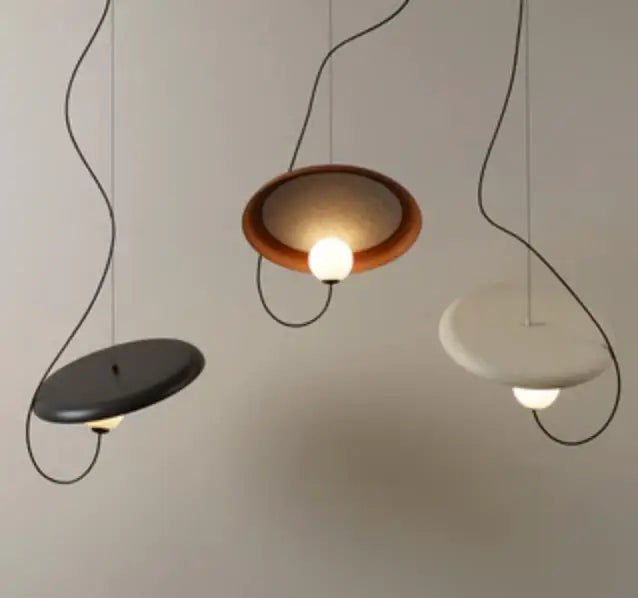Modern DecorBites™ Scandinavian pendant light with sleek curved black cords and circular matte black, wood, and ceramic shades