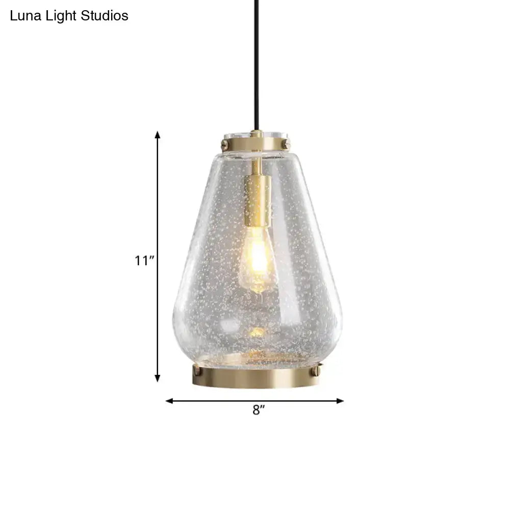 DecorBites™ Seeded glass pendant light with textured clear glass shade and brass rim perfect for bedrooms