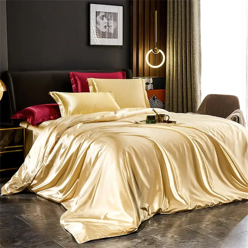 Decorbites silk bedding set featuring a glossy gold satin pcs duvet cover with cream and burgundy matching pillows