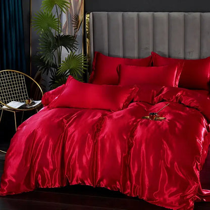 Vibrant red decorbites™ silk bedding set with glossy satin duvet cover and matching pillows for width bed use