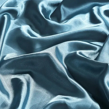 Luxurious teal satin silk duvet cover with smooth glossy finish and flowing folds for twin queen king pcs bedding set