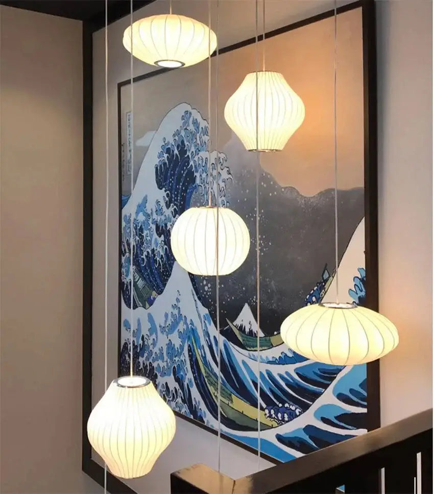 Five warm-toned silk ribbed paper pendant lamps hanging ceiling mounted modern led pendant lamp by DecorBites