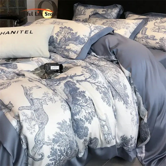 Blue and white toile-patterned satin duvet cover set with subtle sheen made of silky eucalyptus fiber by DecorBites