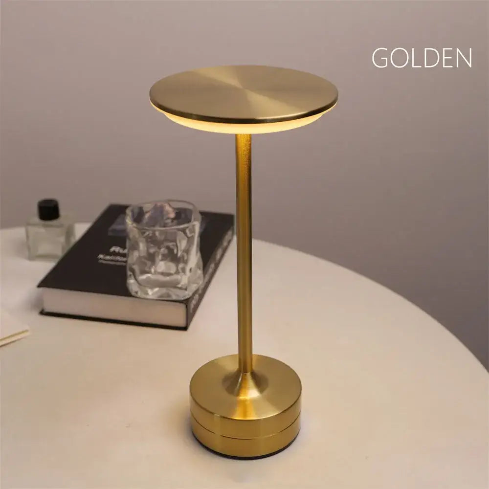 Golden minimalist decorbites™ simple charging led desk lamp with sleek cylindrical brushed metal design for restaurant and bar use